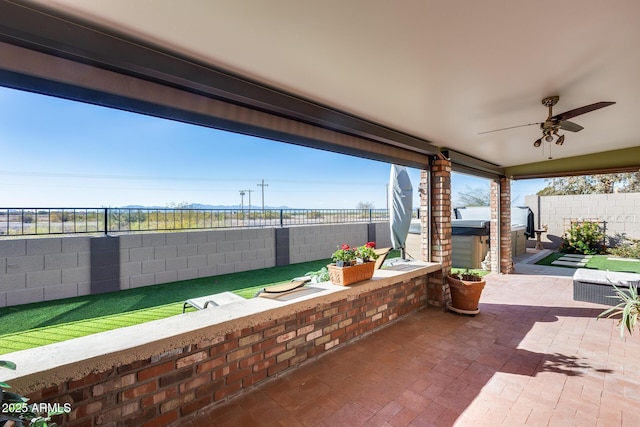 view of patio / terrace with ceiling fan