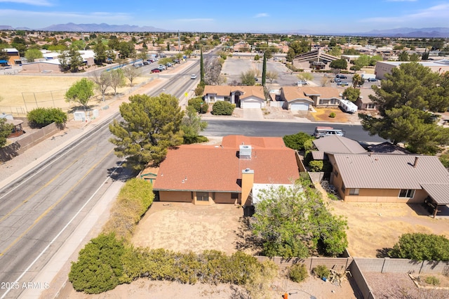 aerial view with a mountain view and a residential view