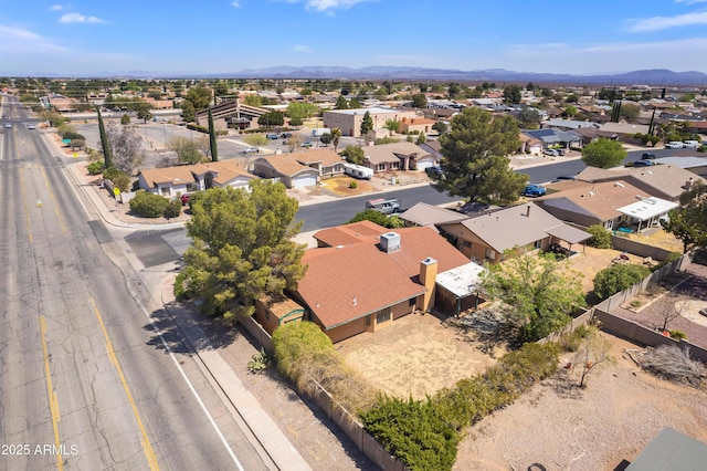 drone / aerial view with a residential view and a mountain view