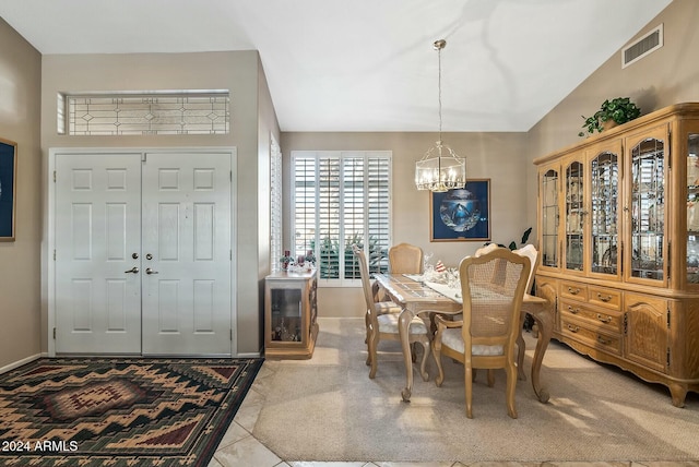 dining area with visible vents, vaulted ceiling, baseboards, and an inviting chandelier