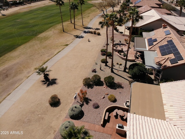 birds eye view of property with golf course view