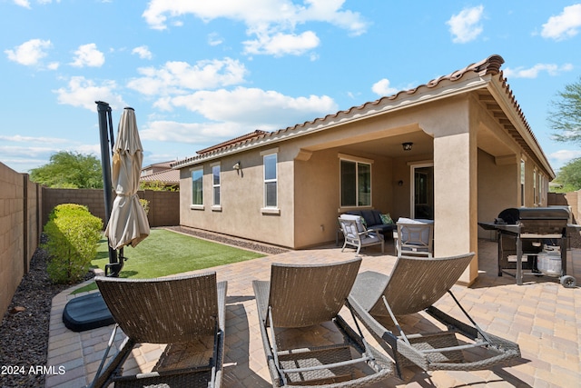 view of patio with a grill