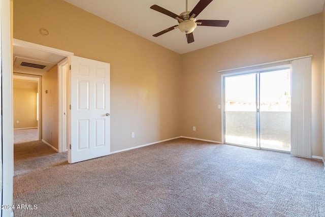 empty room featuring ceiling fan and light colored carpet