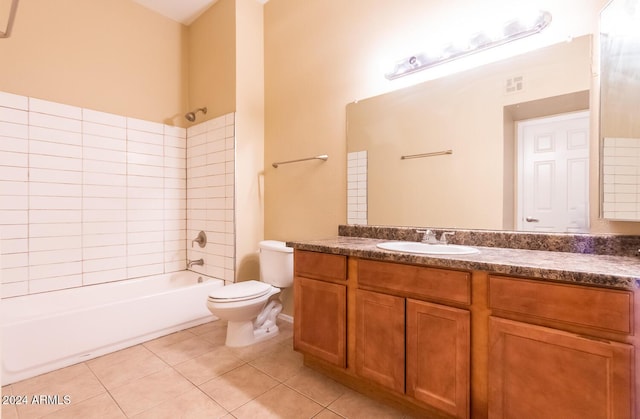 full bathroom with toilet, vanity, tile patterned floors, and shower / washtub combination