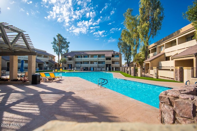 view of pool featuring a patio area