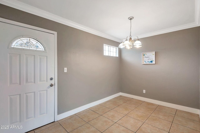 4427 W Crittenden Ln, Phoenix, AZ 85031 - entryway with crown molding, a chandelier, baseboards, and light tile patterned floors