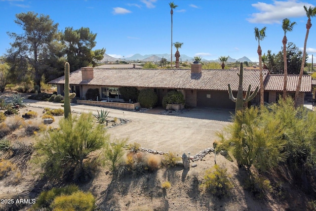 ranch-style house with a mountain view