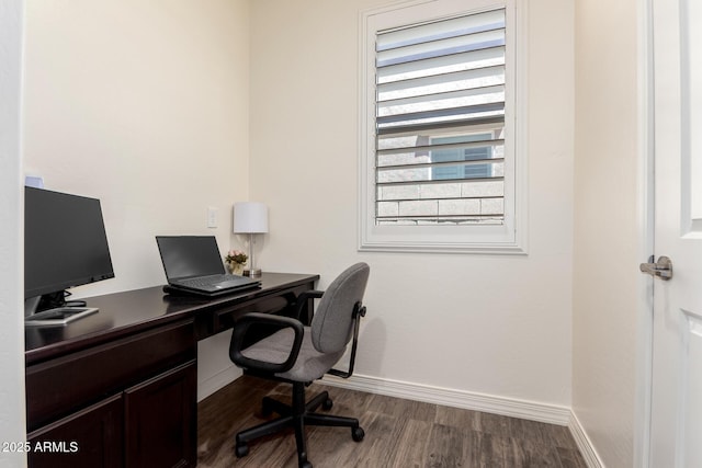 office area featuring dark wood-type flooring and baseboards