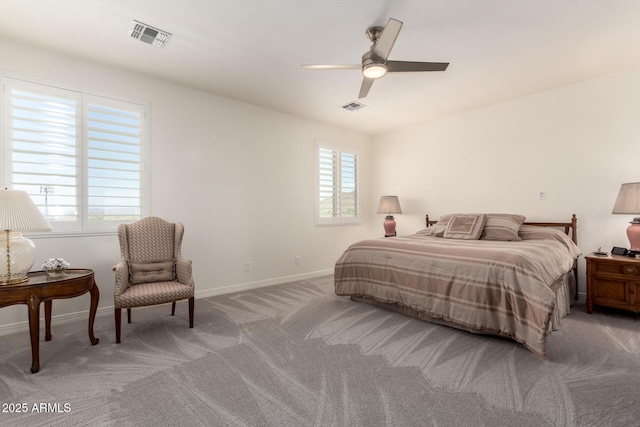 bedroom featuring baseboards, a ceiling fan, visible vents, and light colored carpet