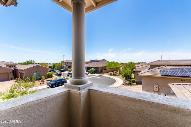 balcony featuring a residential view