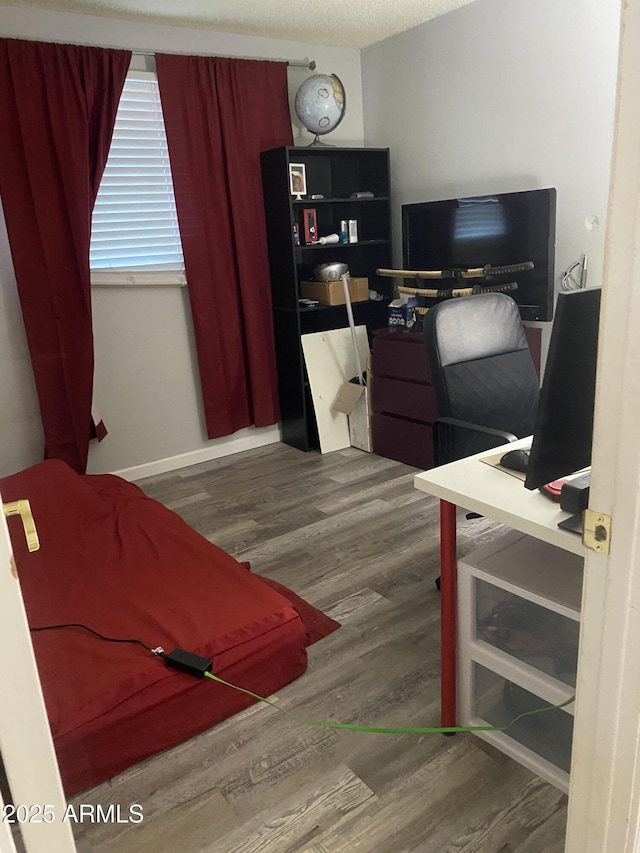 3229 W Cholla St, Phoenix, AZ 85029 - bedroom featuring wood finished floors and a desk