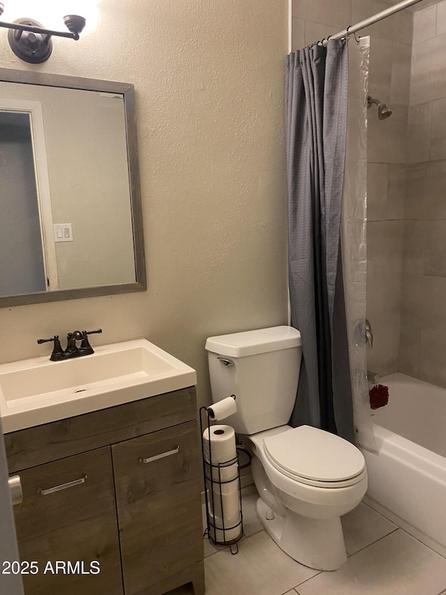 3229 W Cholla St, Phoenix, AZ 85029 - full bathroom featuring vanity, toilet, tile patterned floors, and shower / bath combo
