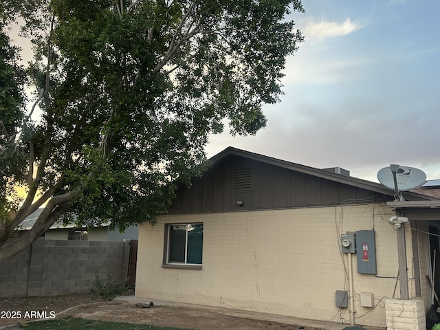 3229 W Cholla St, Phoenix, AZ 85029 - view of property exterior with brick siding and board and batten siding