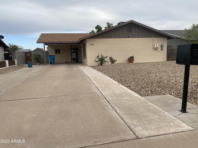 3229 W Cholla St, Phoenix, AZ 85029 - ranch-style home featuring driveway and brick siding