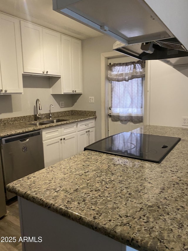 3229 W Cholla St, Phoenix, AZ 85029 - kitchen with a sink, stovetop, dishwasher, white cabinets, and light stone countertops