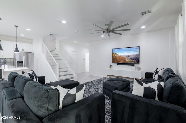 living room with ceiling fan