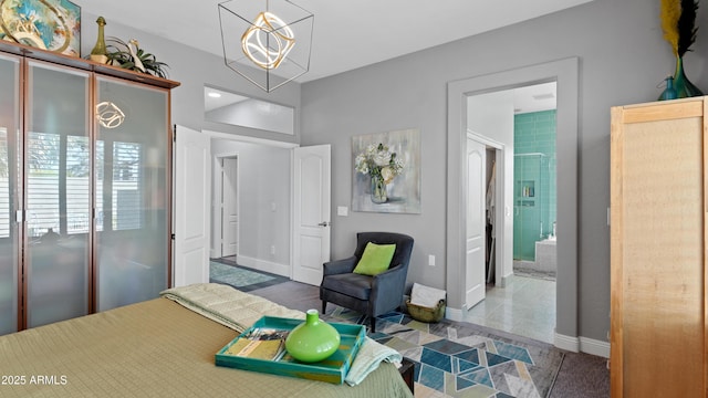 3956 S Hollyhock Pl, Chandler, AZ 85248 - bedroom with an inviting chandelier and baseboards