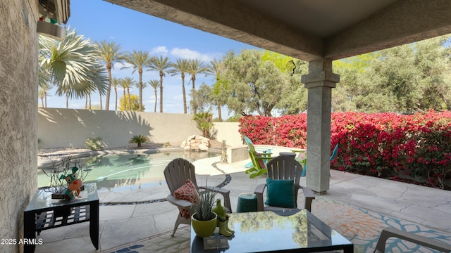 3956 S Hollyhock Pl, Chandler, AZ 85248 - view of patio / terrace with a fenced in pool, outdoor dining area, and a fenced backyard