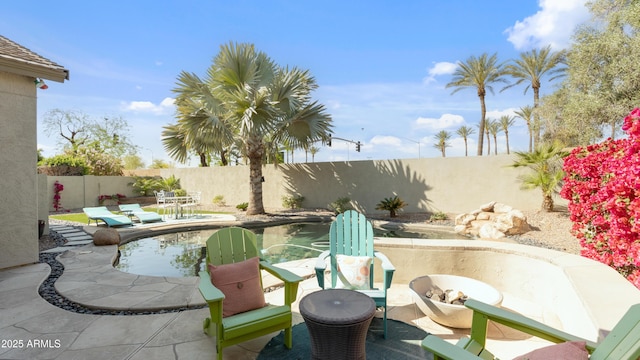 3956 S Hollyhock Pl, Chandler, AZ 85248 - view of patio / terrace with a fenced backyard and a fenced in pool