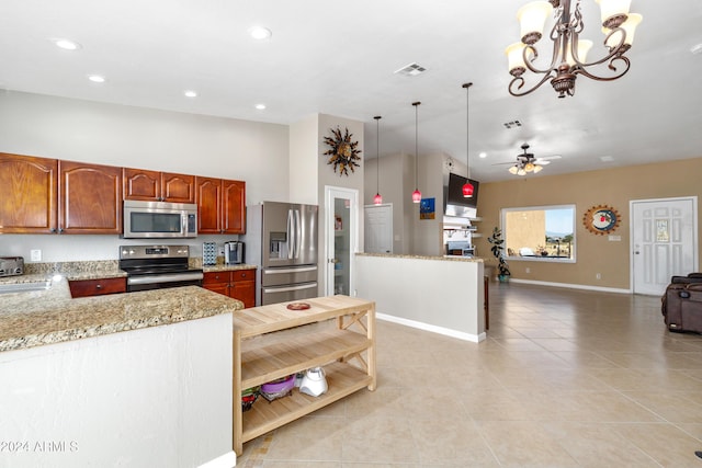 kitchen with decorative light fixtures, visible vents, appliances with stainless steel finishes, open floor plan, and ceiling fan with notable chandelier