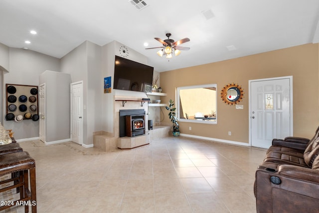 living room with visible vents, baseboards, ceiling fan, light tile patterned flooring, and recessed lighting