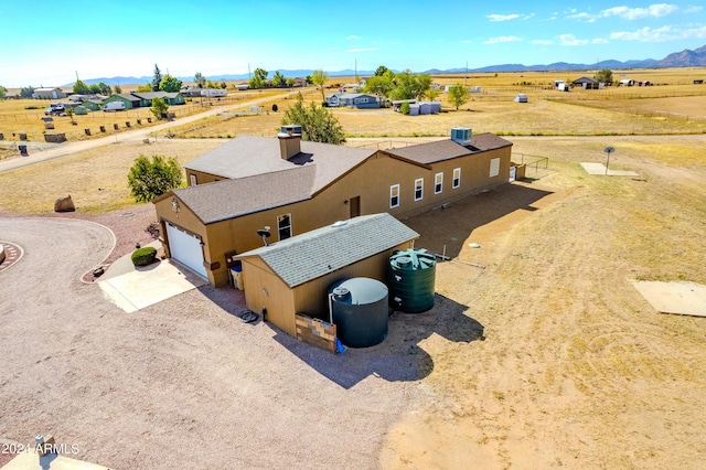 drone / aerial view with a rural view and a mountain view