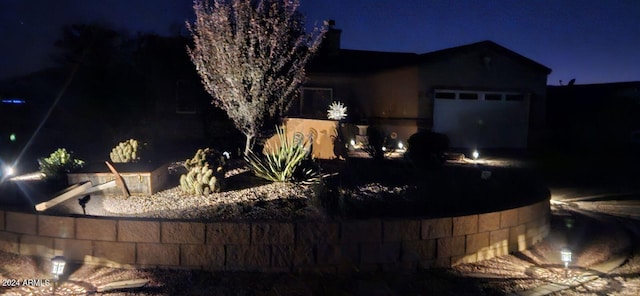 exterior space featuring a garage