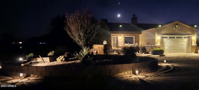 ranch-style home with an attached garage