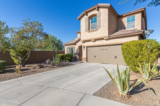 view of property featuring a garage