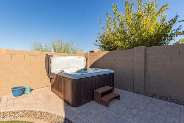 view of patio featuring a hot tub