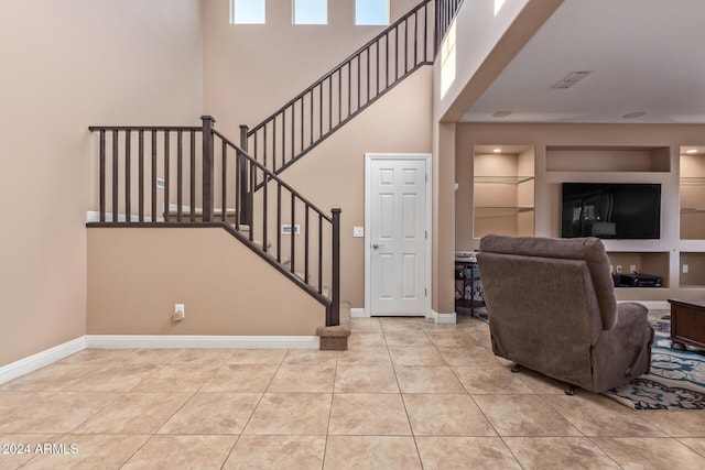 interior space featuring light tile patterned floors