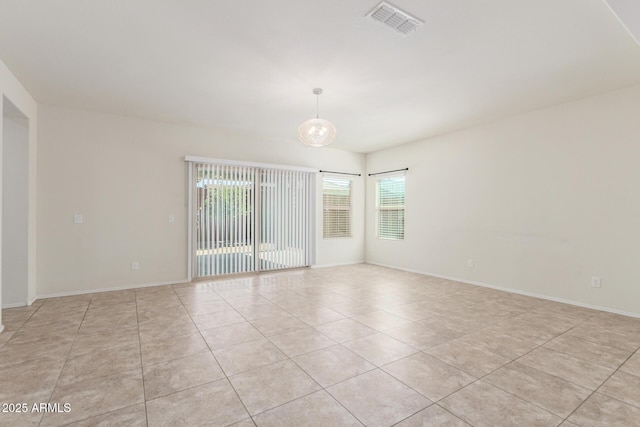 25945 W Runion Dr, Buckeye, AZ 85396 - unfurnished room featuring light tile patterned flooring and baseboards