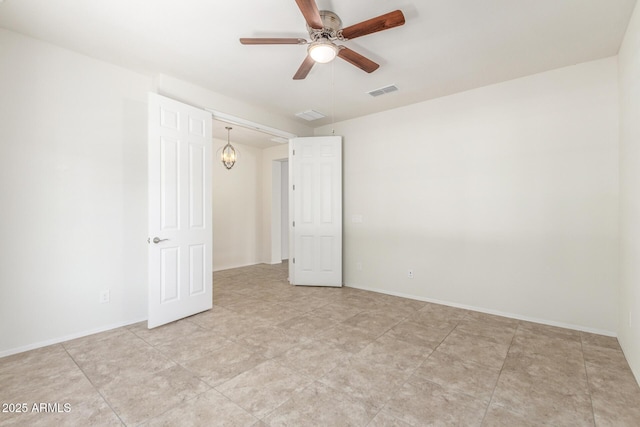 25945 W Runion Dr, Buckeye, AZ 85396 - empty room with ceiling fan and baseboards