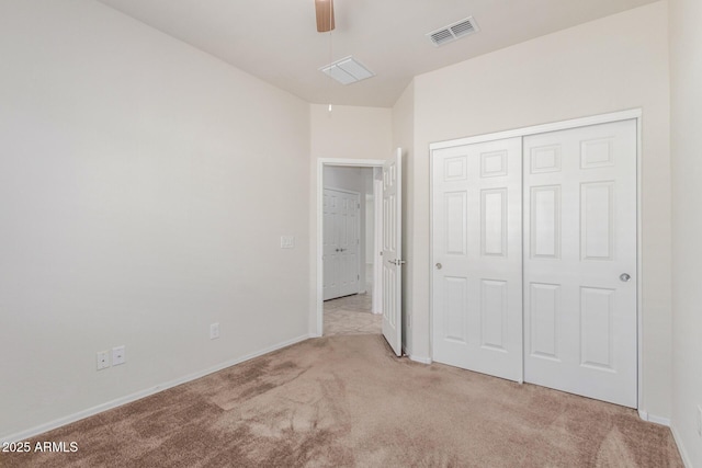 25945 W Runion Dr, Buckeye, AZ 85396 - unfurnished bedroom with carpet flooring, a closet, and a ceiling fan
