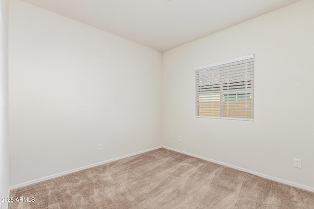 25945 W Runion Dr, Buckeye, AZ 85396 - spare room with light carpet and baseboards
