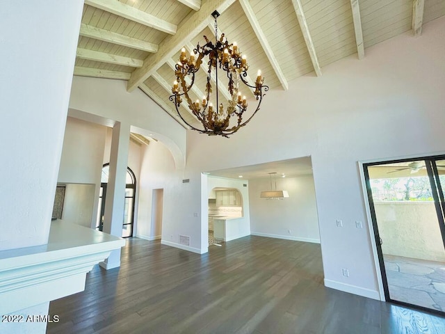 unfurnished living room with a chandelier, high vaulted ceiling, wooden ceiling, dark hardwood / wood-style floors, and beam ceiling