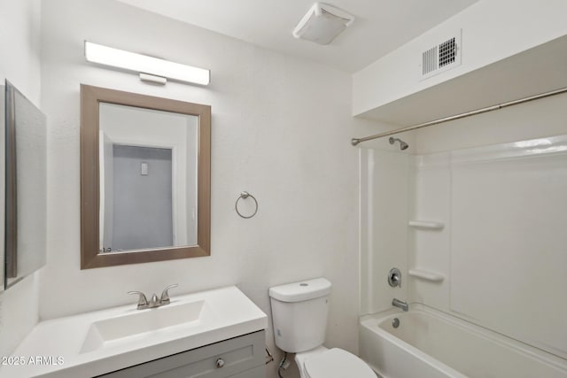 full bathroom featuring vanity, toilet, and washtub / shower combination