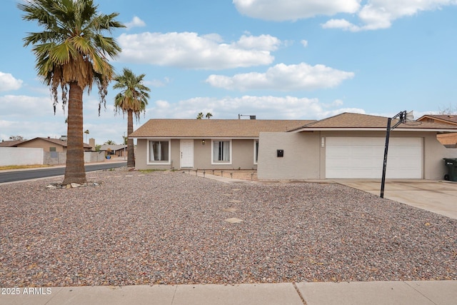 single story home with a garage