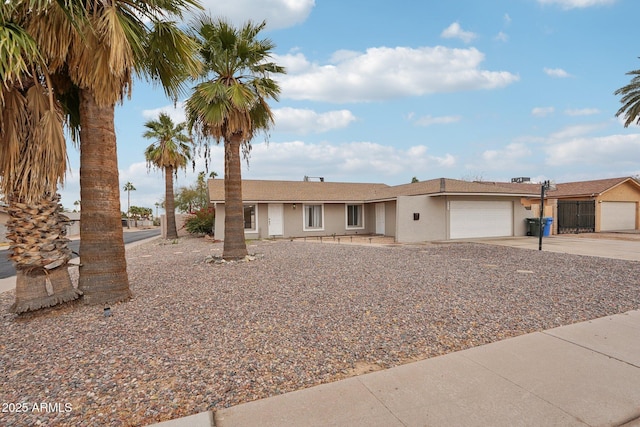 single story home featuring a garage