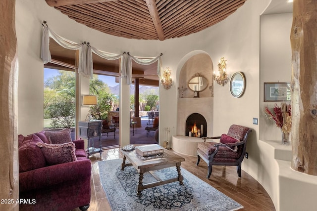 interior space with wood finished floors and a fireplace