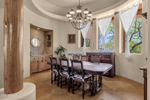 dining area with a chandelier