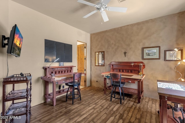 home office featuring a ceiling fan and wood finished floors