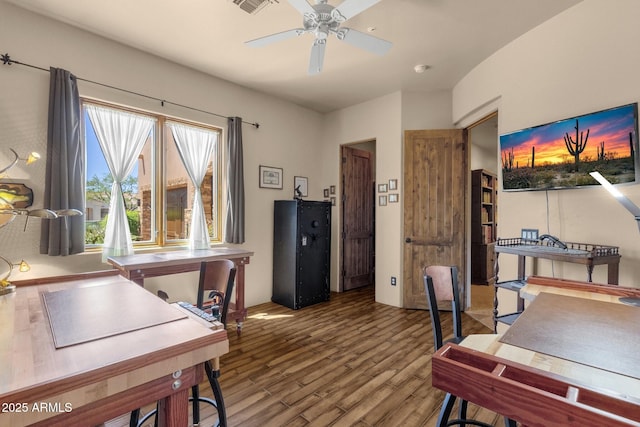 office area featuring a ceiling fan and wood finished floors