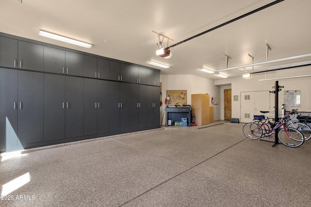 garage featuring a garage door opener