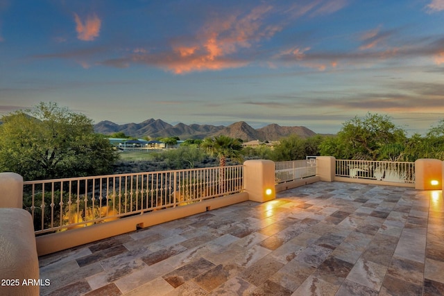view of patio / terrace with a mountain view