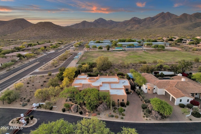 drone / aerial view featuring a mountain view