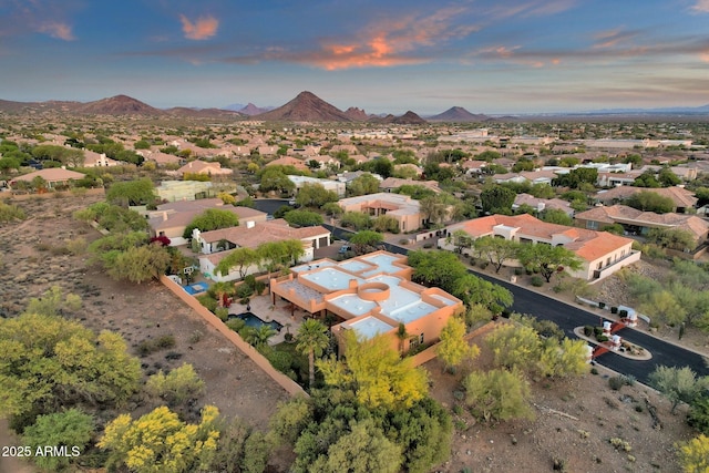 aerial view featuring a mountain view and a residential view
