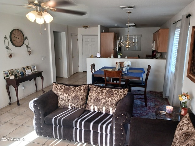 7118 S 37th Gln, Phoenix, AZ 85041 - dining area featuring light tile patterned floors and a ceiling fan