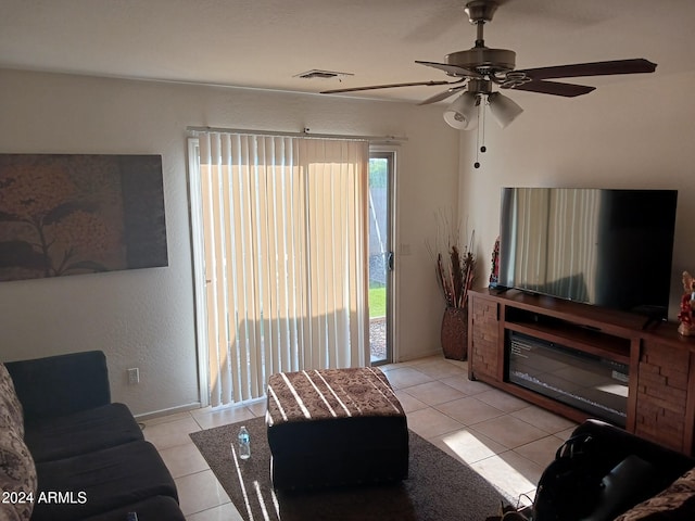 7118 S 37th Gln, Phoenix, AZ 85041 - living area with tile patterned flooring and a ceiling fan