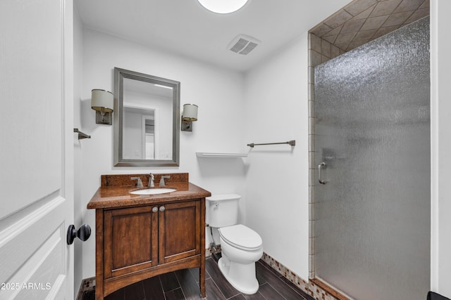 5435 E Cambridge Ave, Phoenix, AZ 85008 - bathroom featuring a stall shower, vanity, and wood tiled floors